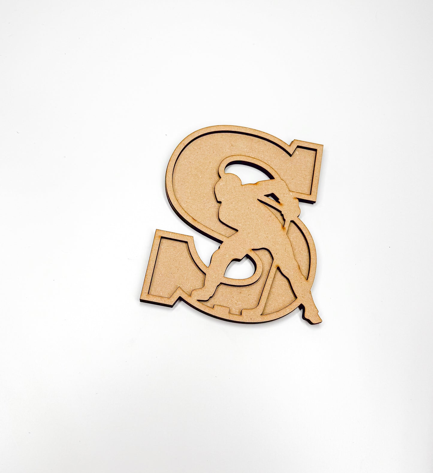 a wooden cut out of the letter s