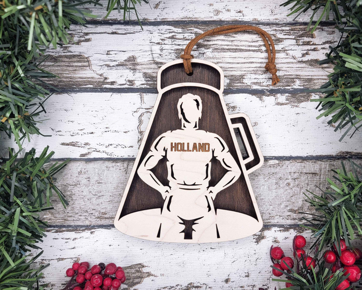 a wooden ornament with a picture of a man on it