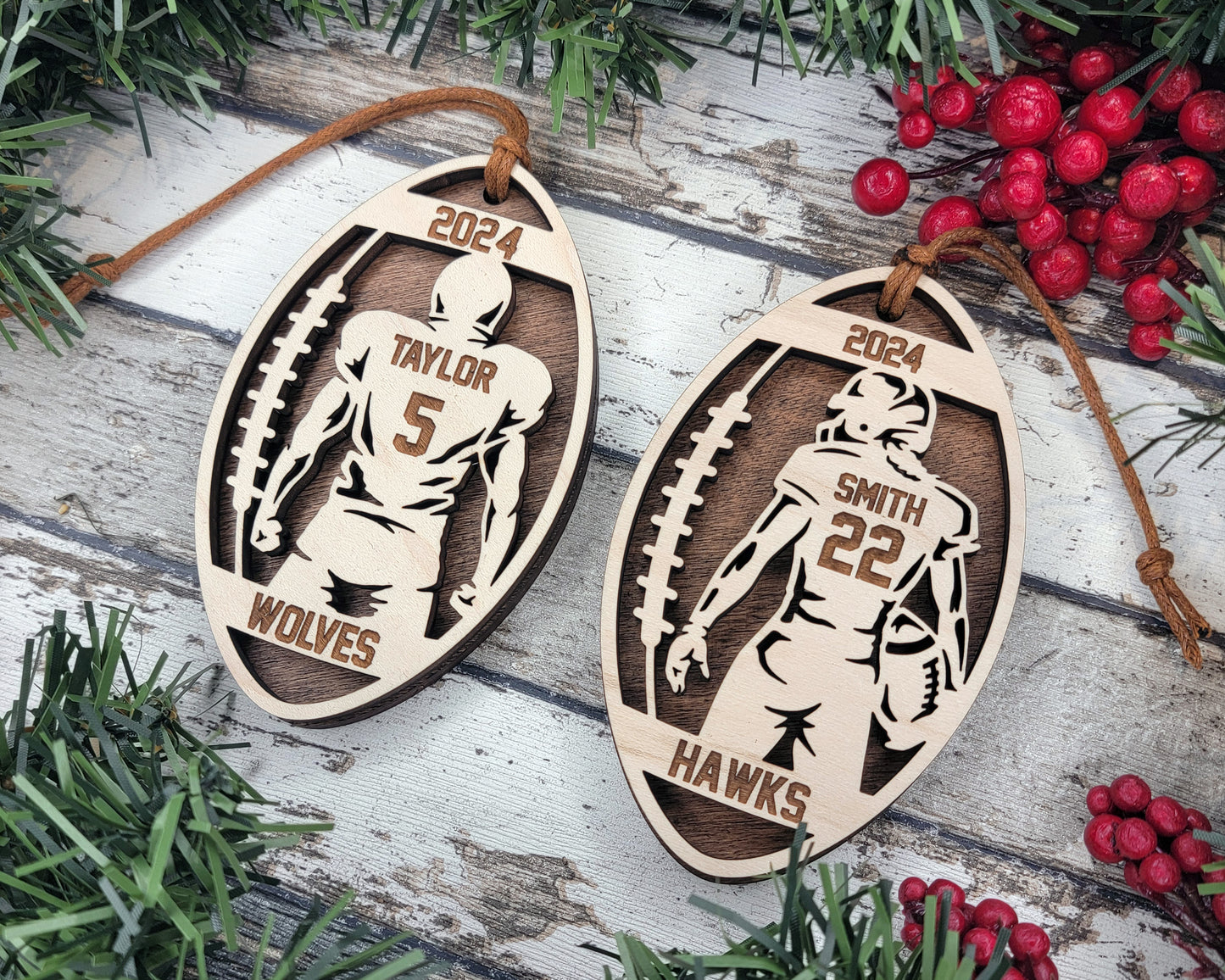 two wooden ornaments with a football player on them