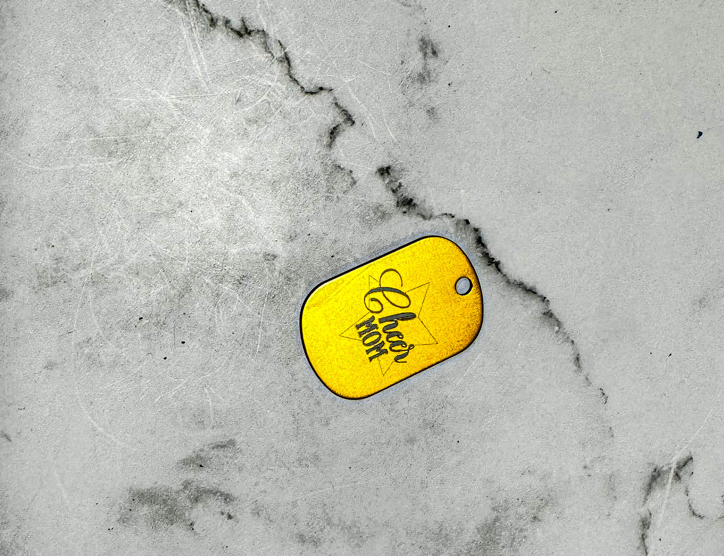 a yellow tag that is on the ground