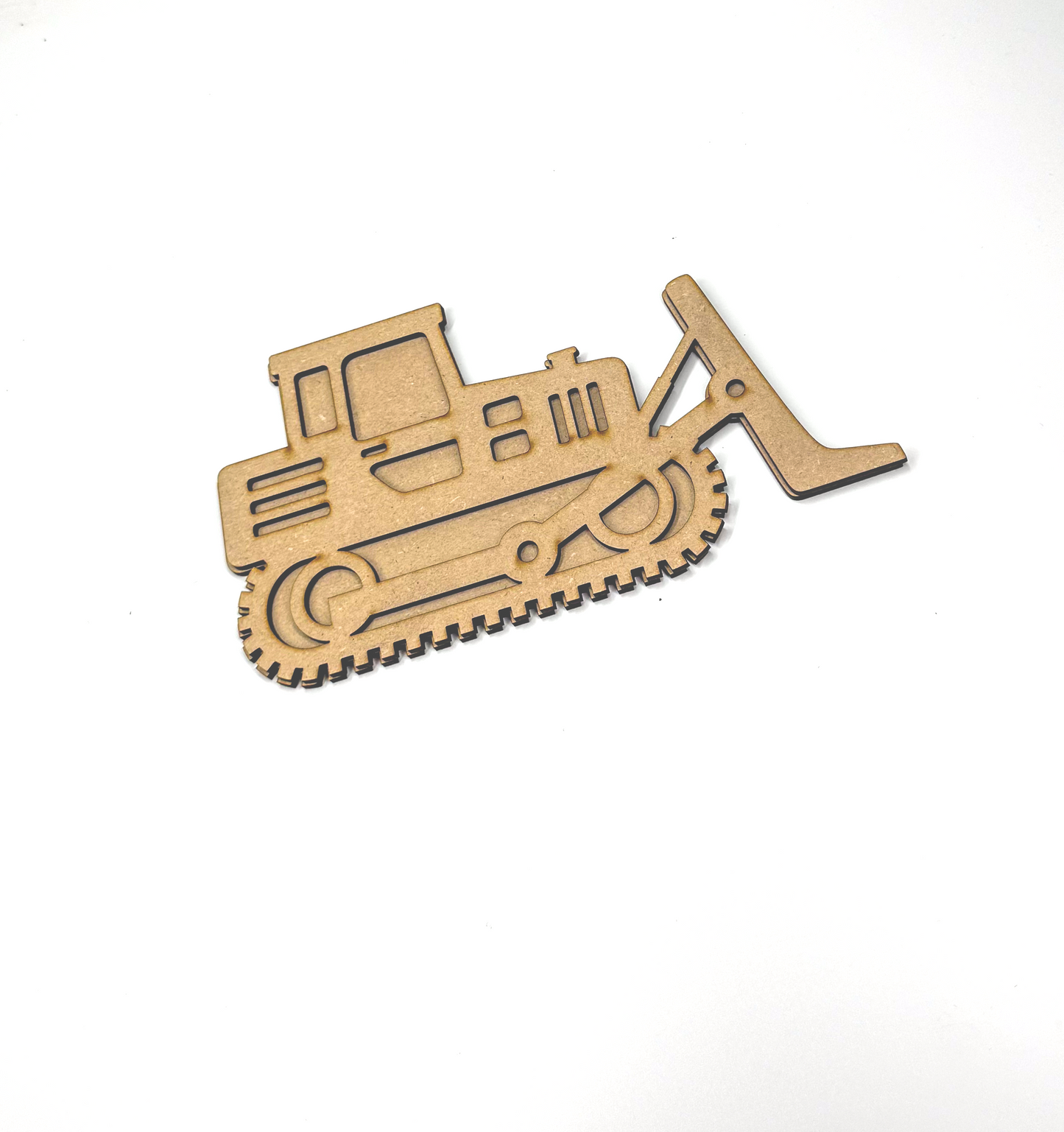 a wooden cutout of a construction vehicle