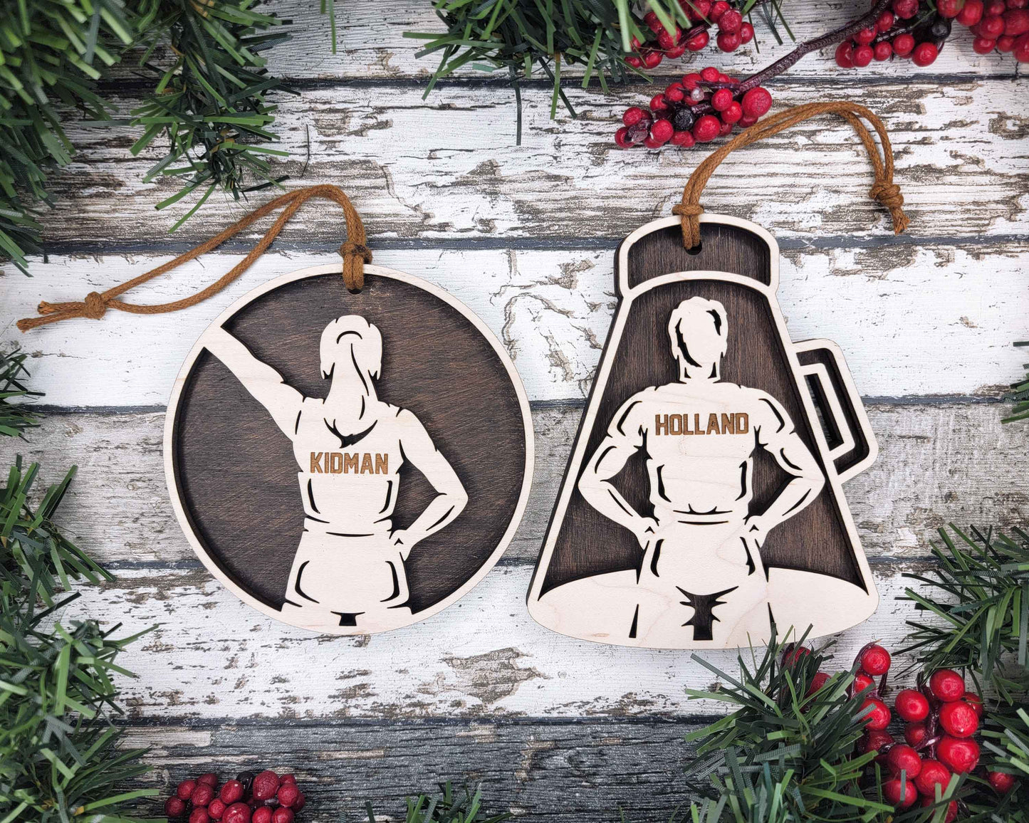 a couple of wooden tags hanging from a tree