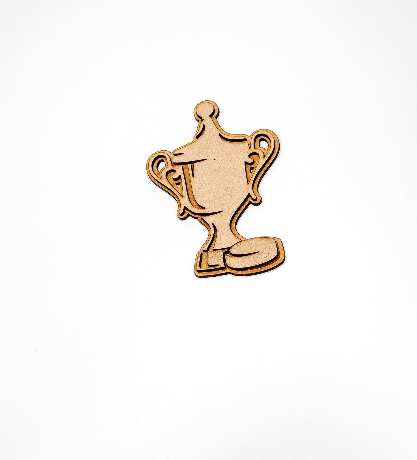 a wooden cutout of a trophy on a white background