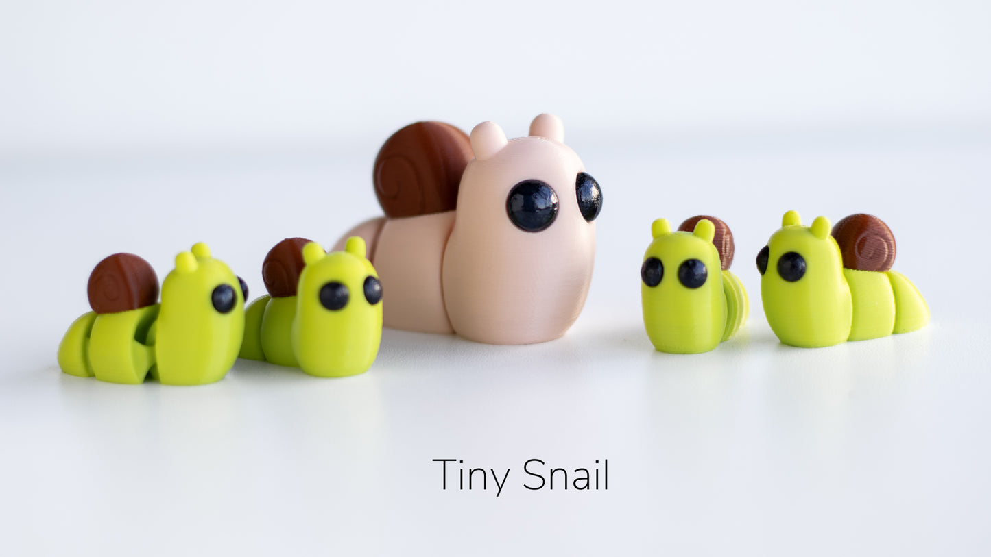 a group of small toy animals sitting next to each other