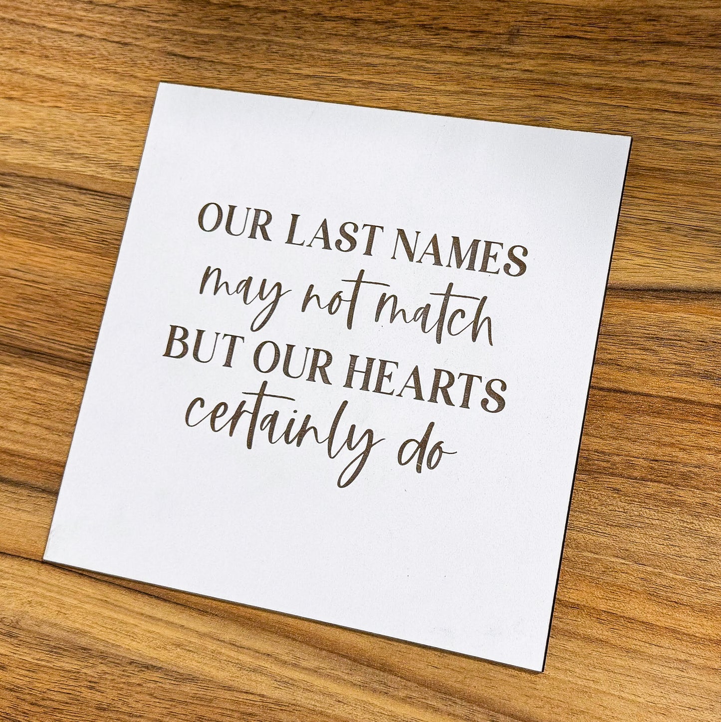 Our Last Names may not match Sign