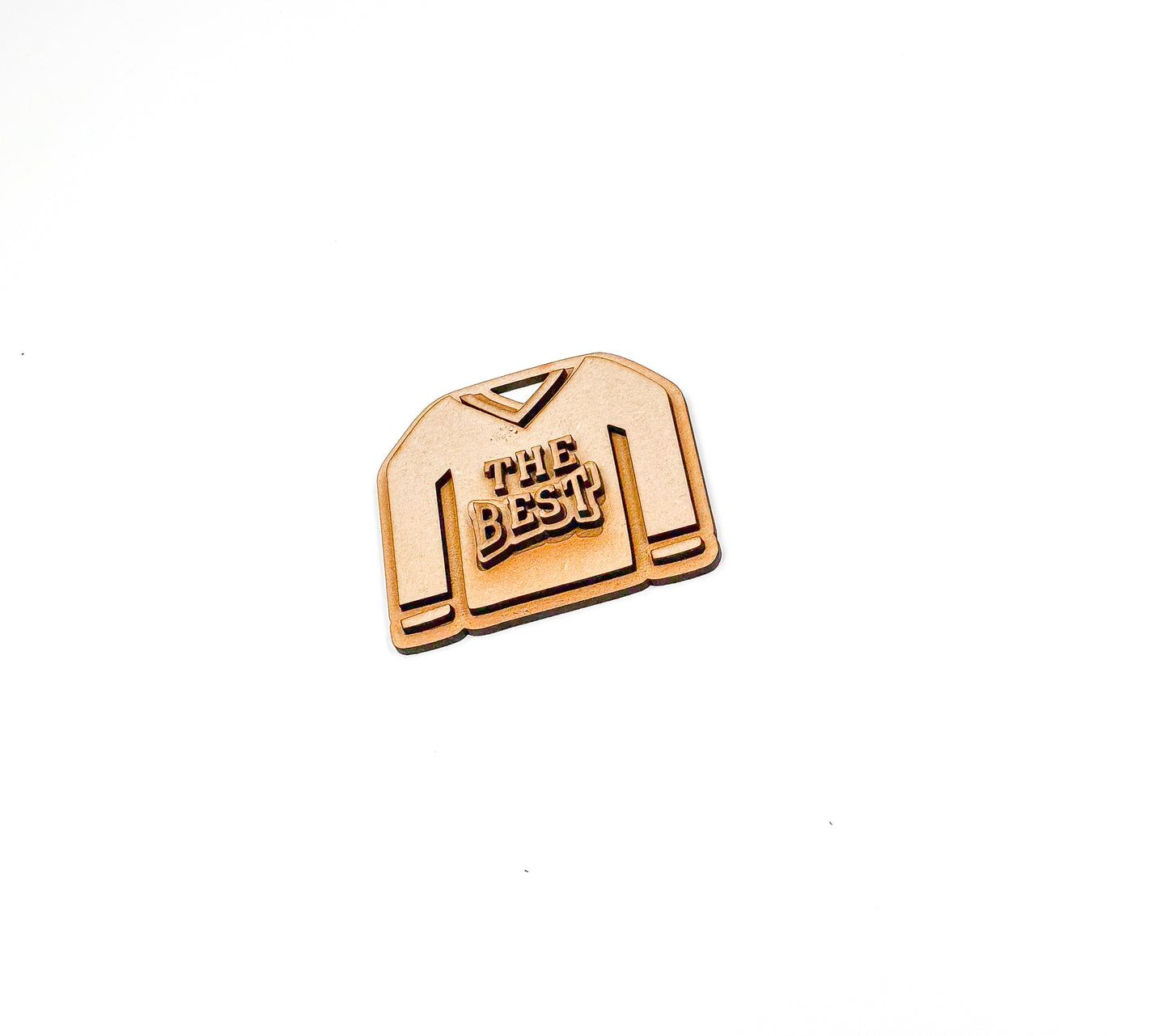 a close up of a metal object on a white background