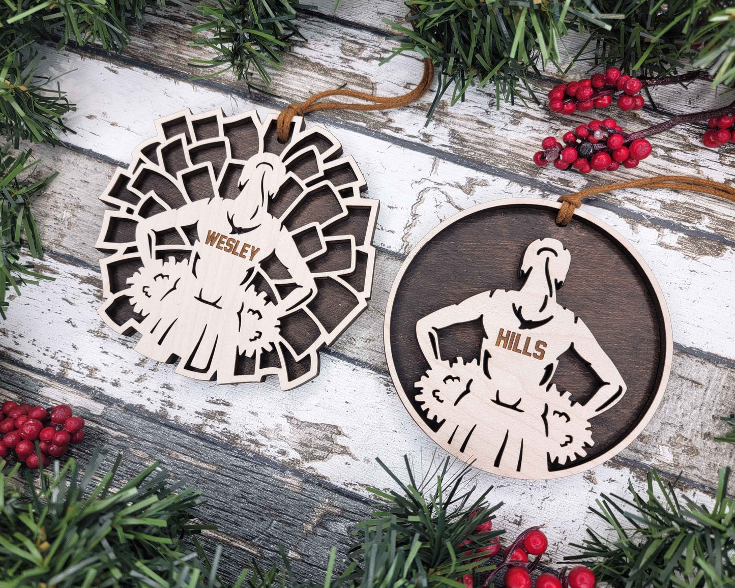 two wooden christmas ornaments on a wooden table