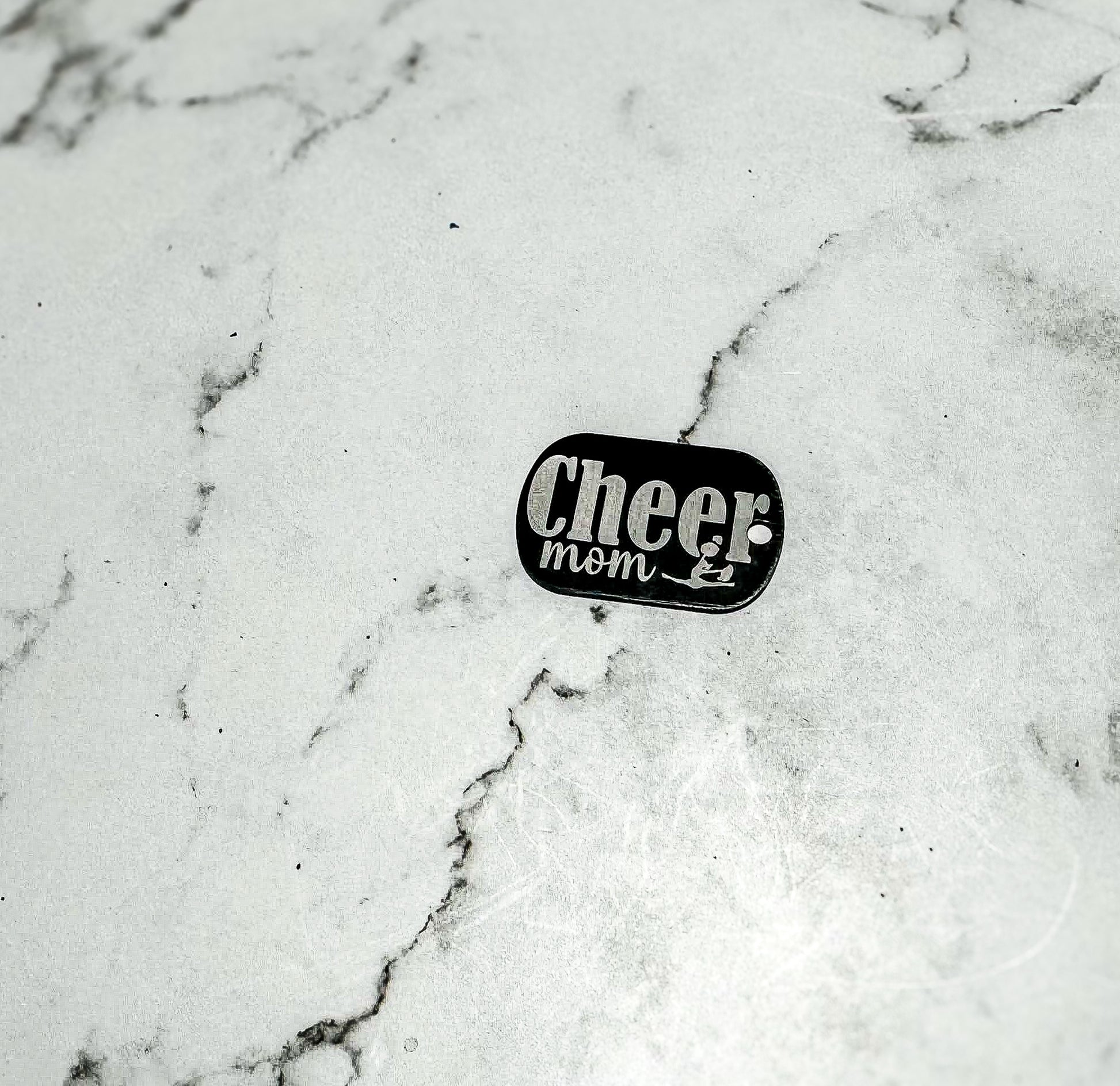 a close up of a sticker on a marble surface