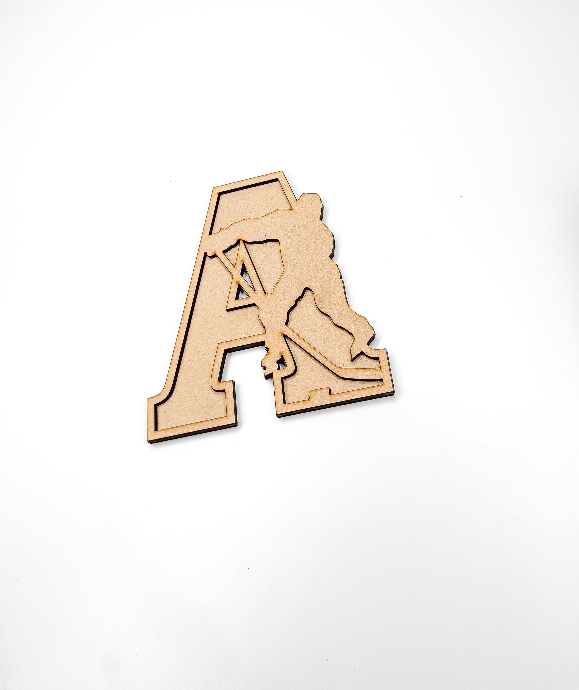 a wooden cut out of the letter a