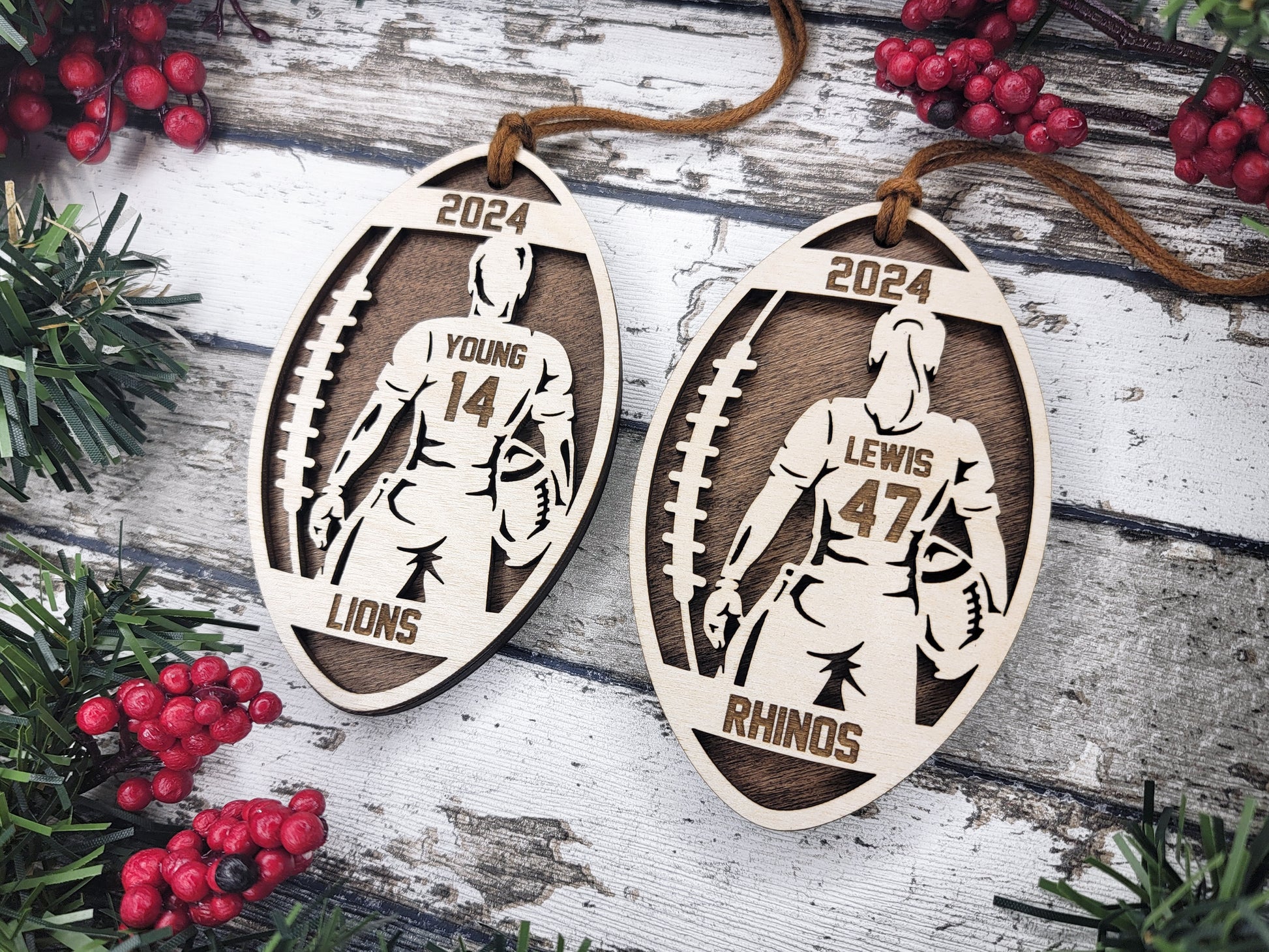 two wooden ornaments with a football player on them