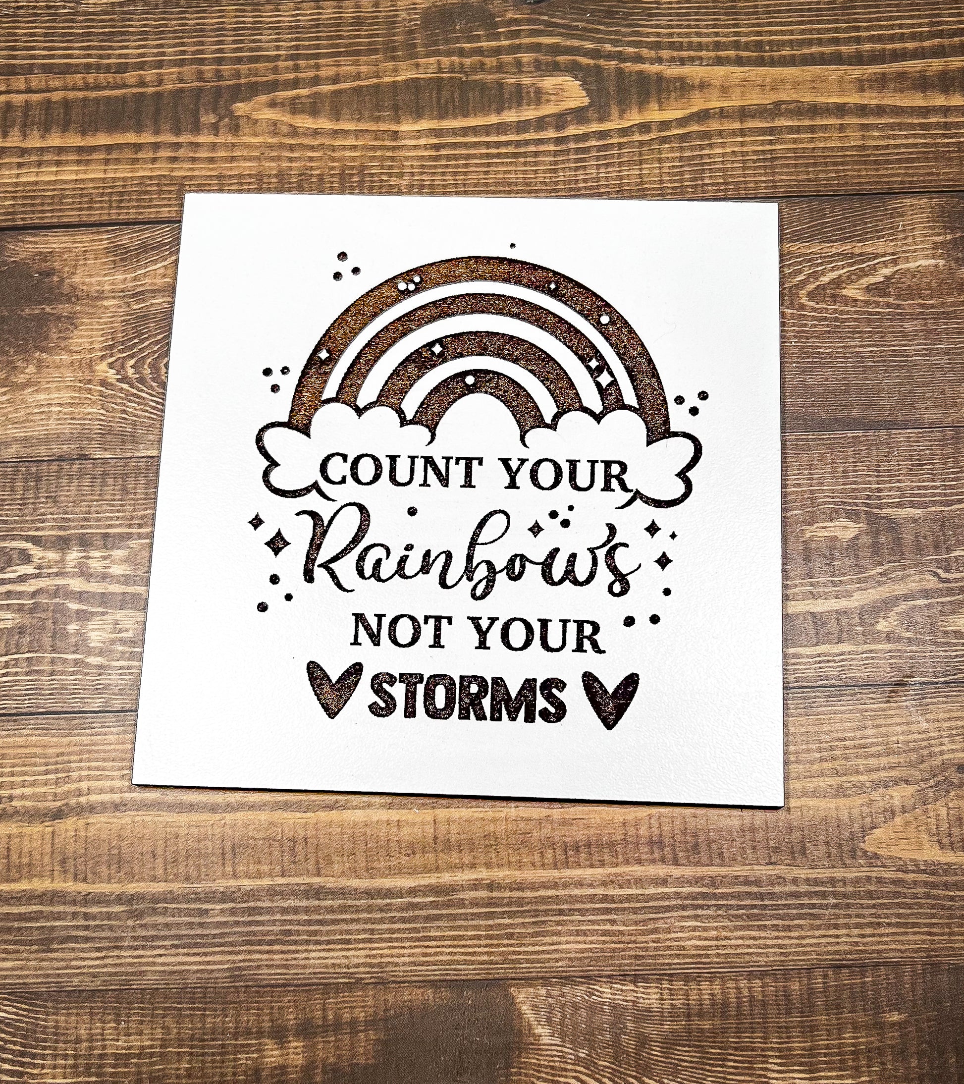 a card that says count your rainbows not your storm