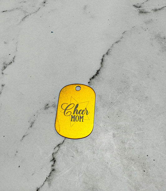 a yellow dog tag that says ohr hot on it