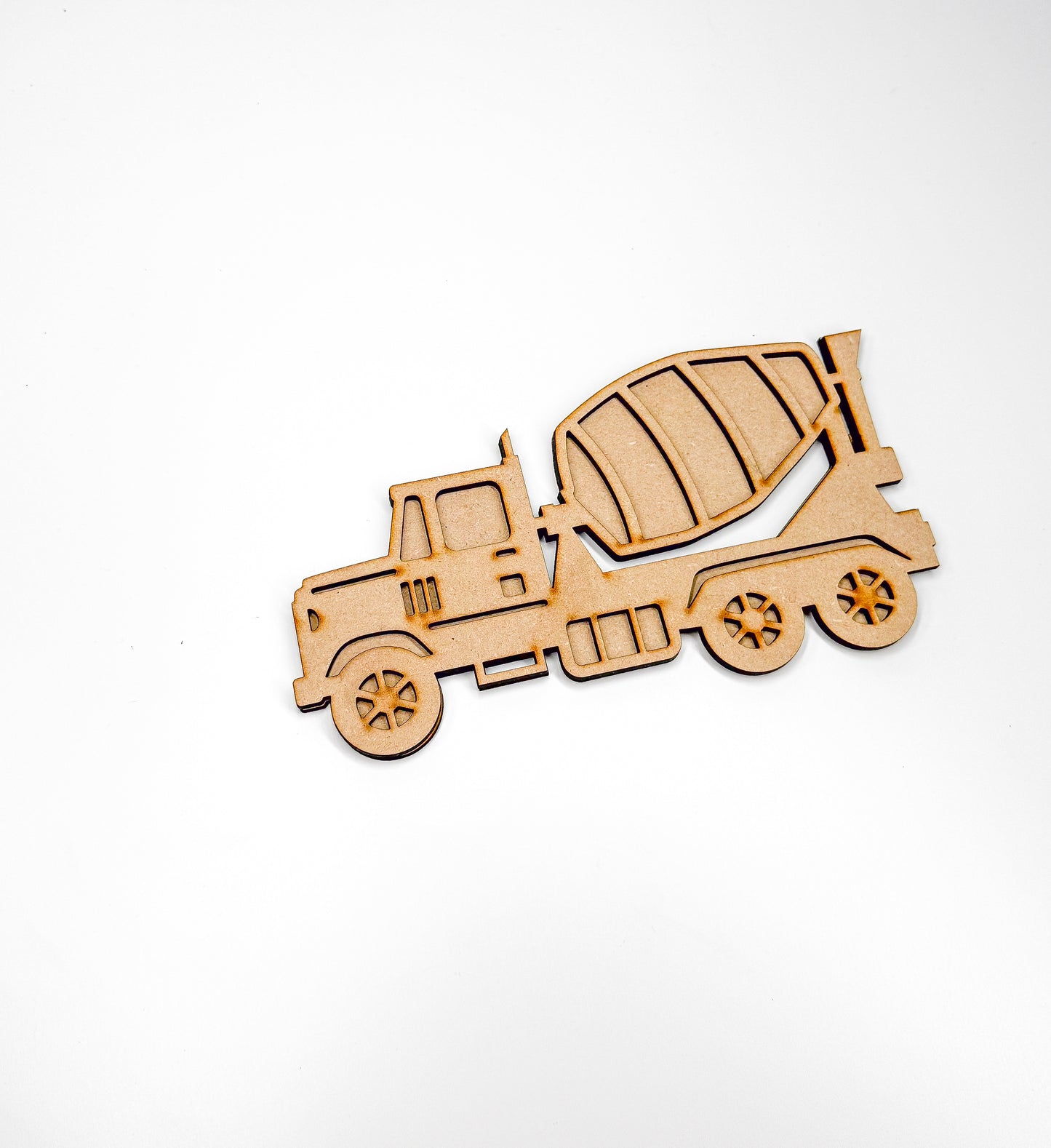 a wooden cutout of a cement truck