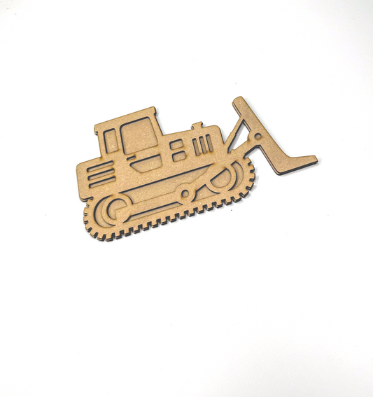 a wooden cutout of a construction vehicle