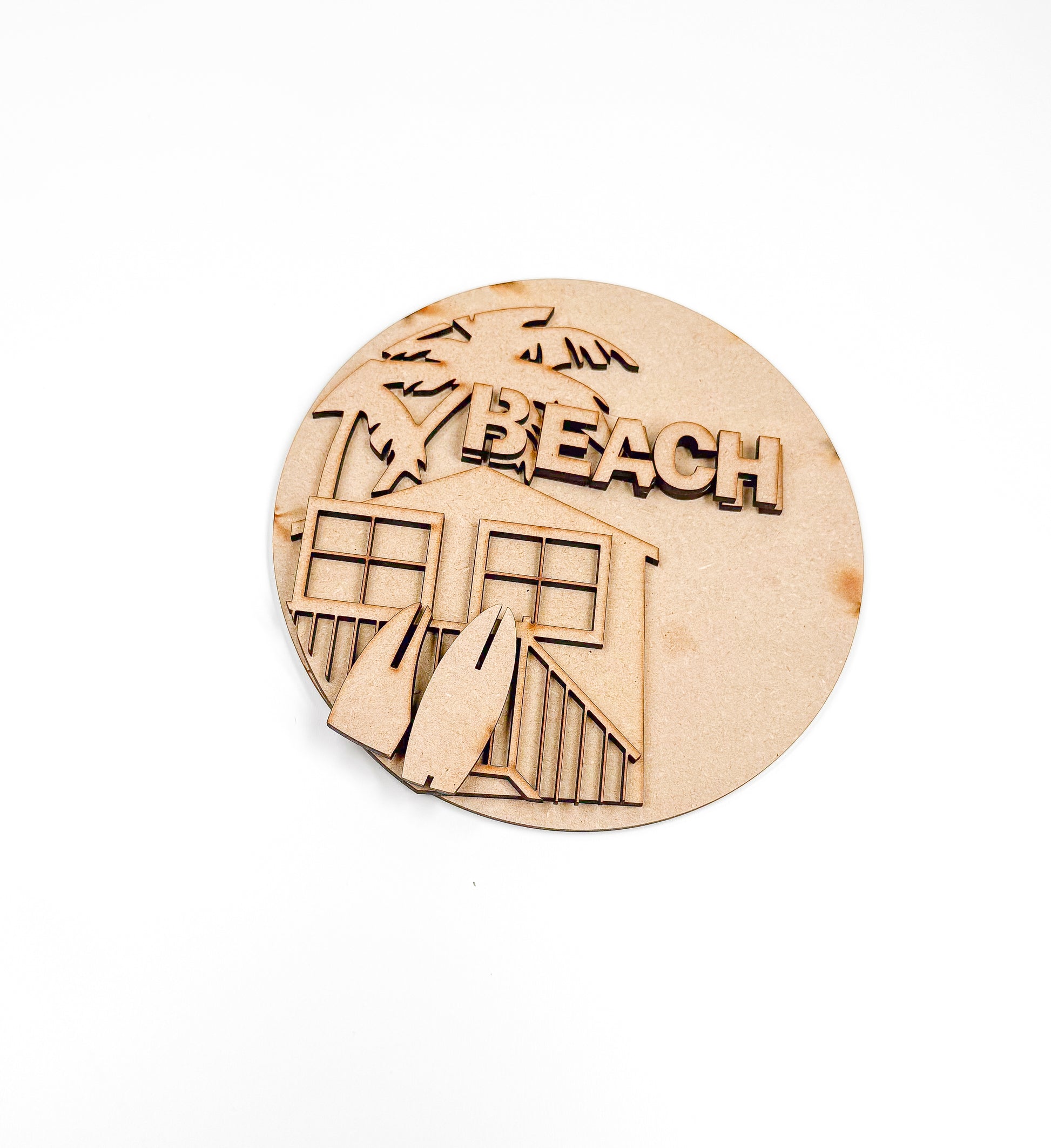 a picture of a wooden beach sign on a white background