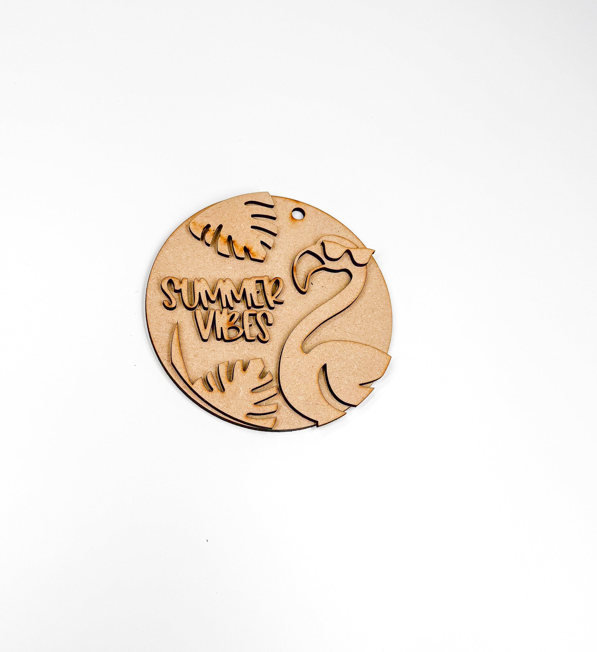 a picture of a wooden brooch with the words summer seven on it