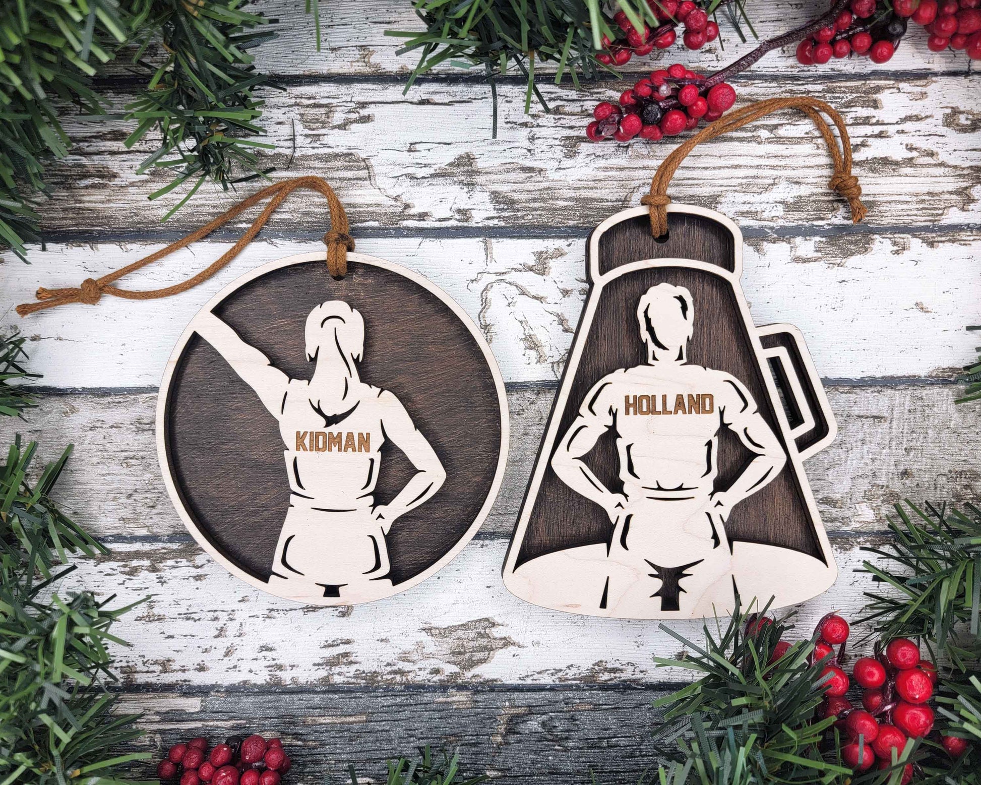a couple of wooden tags hanging from a tree