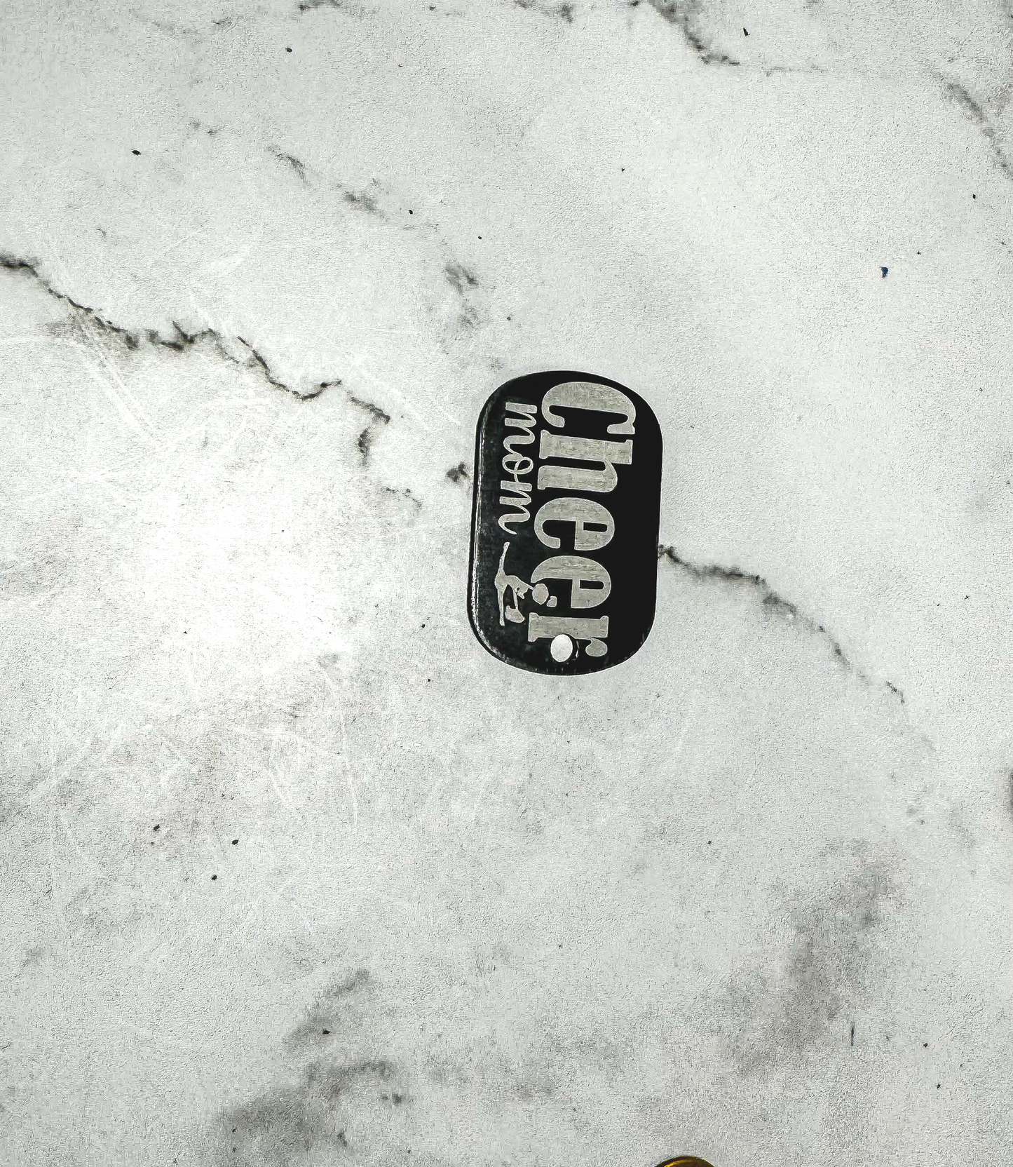 a skateboard that is laying on a marble surface