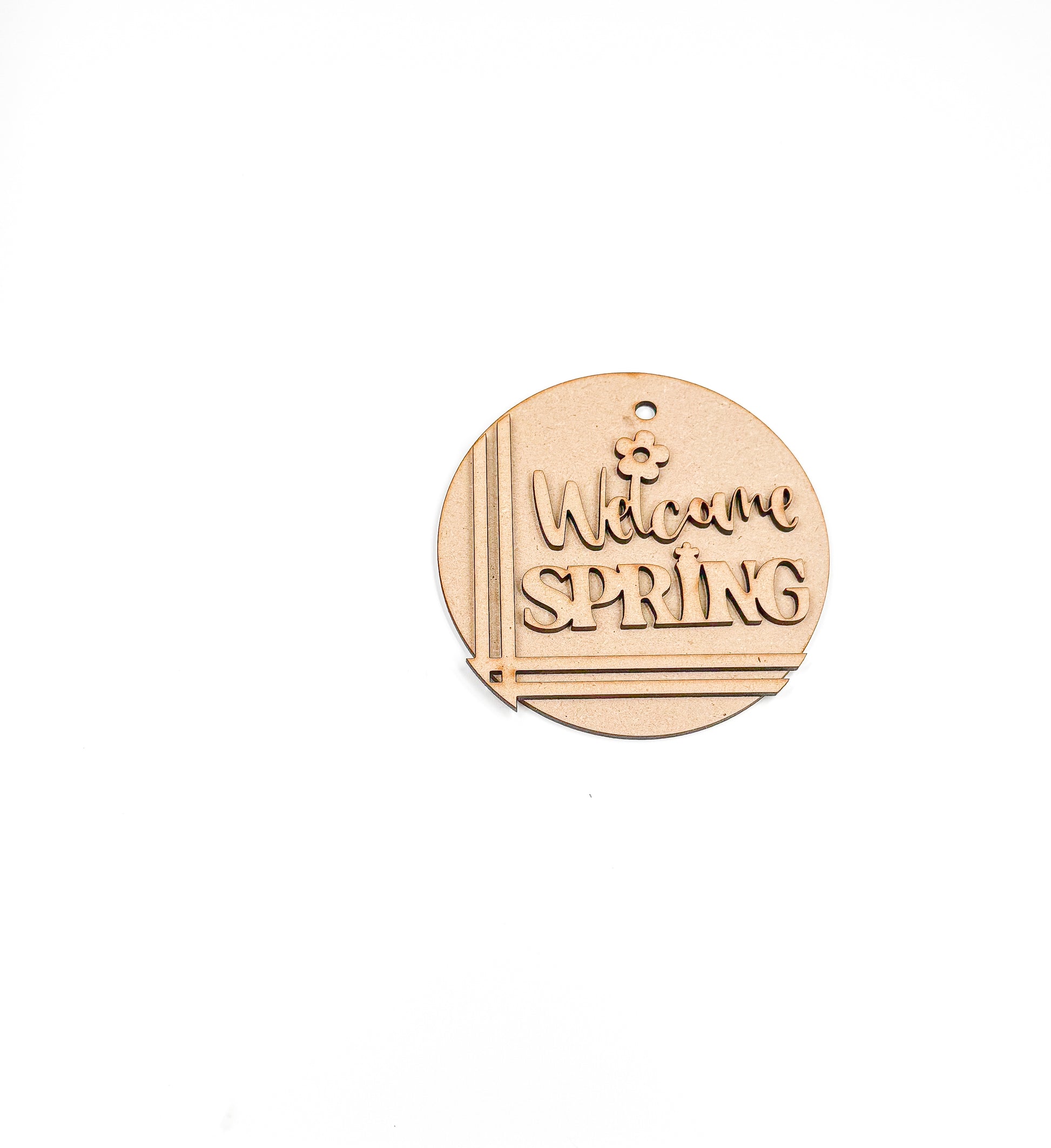 a metal ornament that says welcome spring