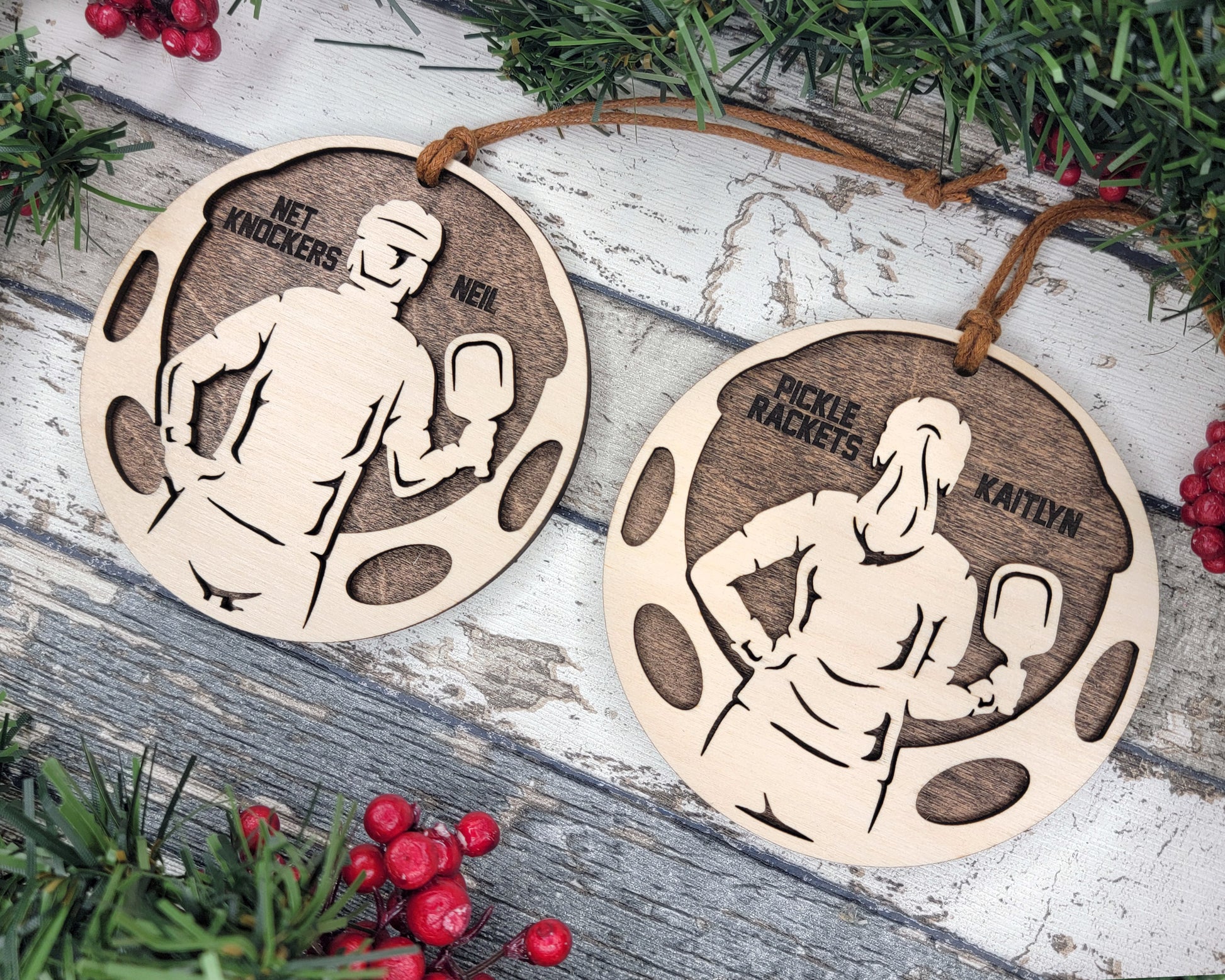 a couple of wooden ornaments sitting on top of a wooden table