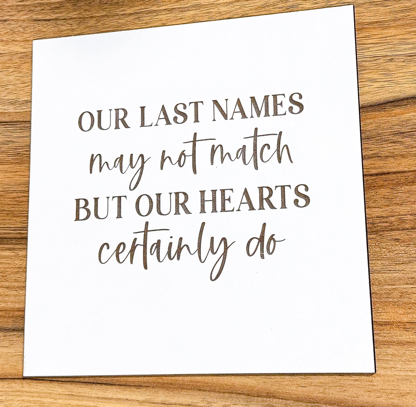 Our Last Names may not match Sign
