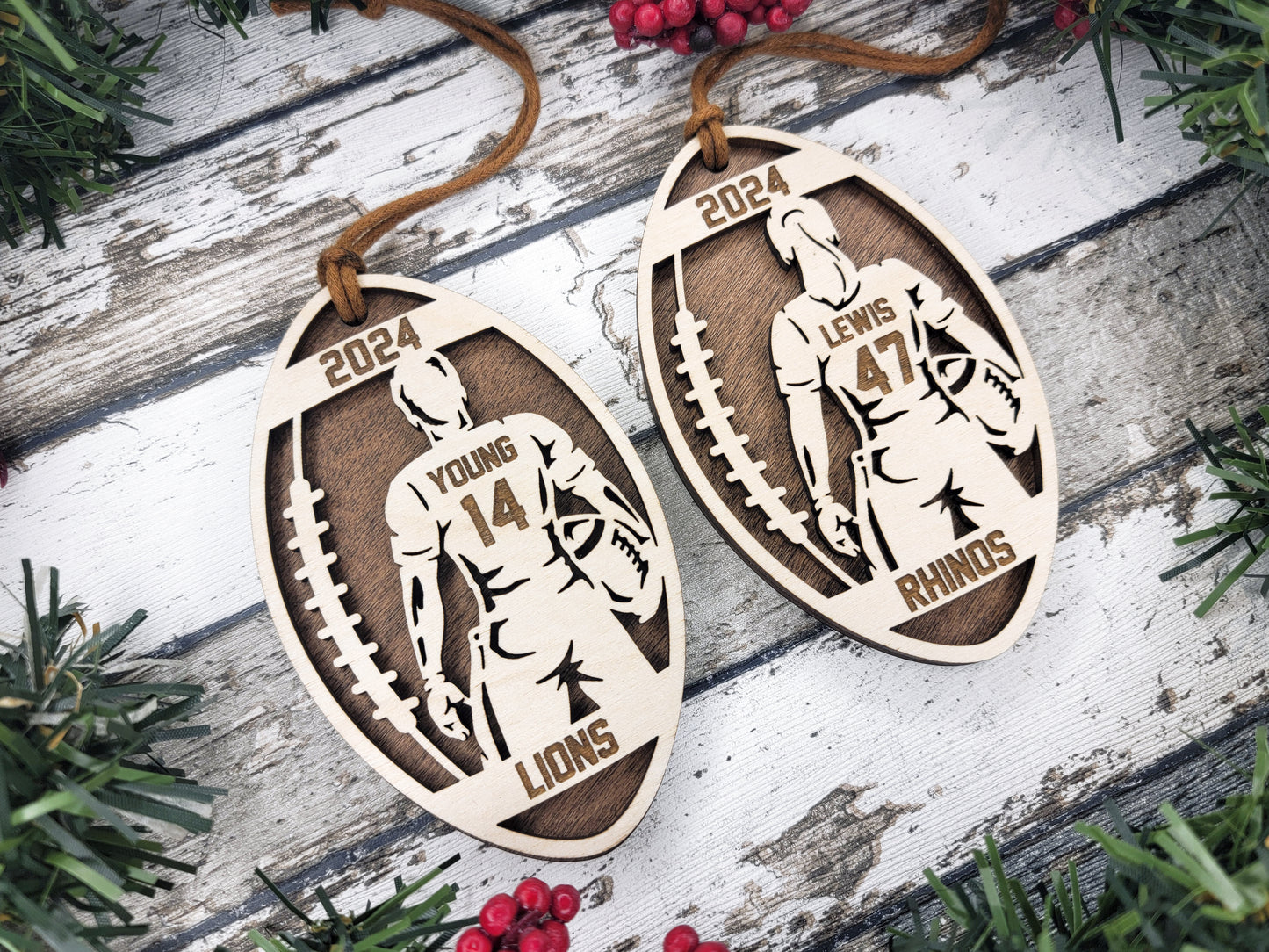 a pair of wooden earrings with a picture of a man riding a horse