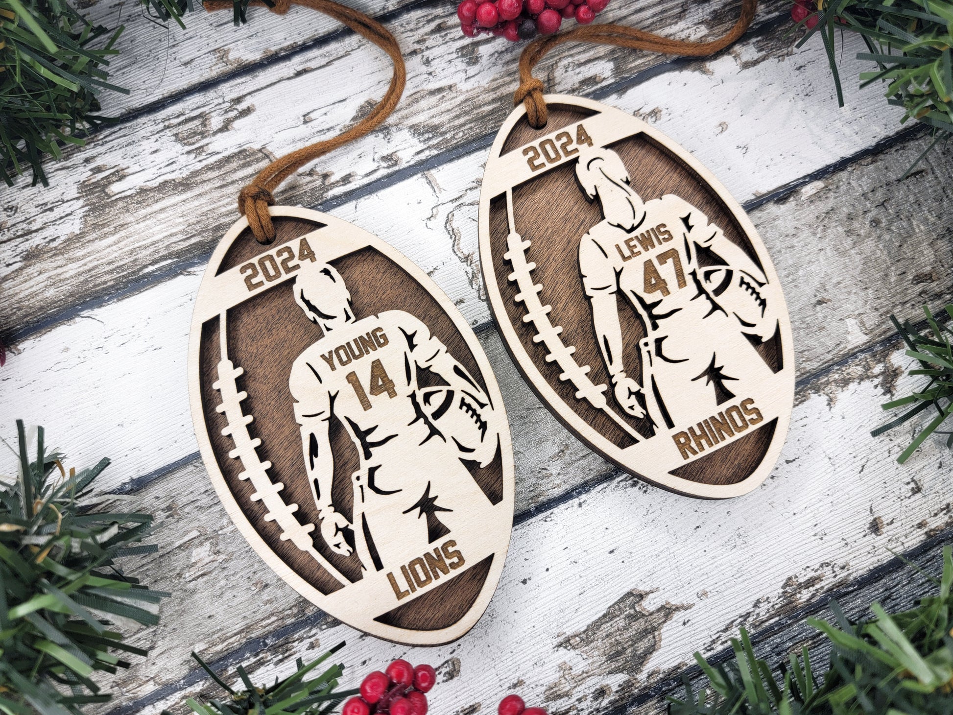 a pair of wooden earrings with a picture of a man riding a horse