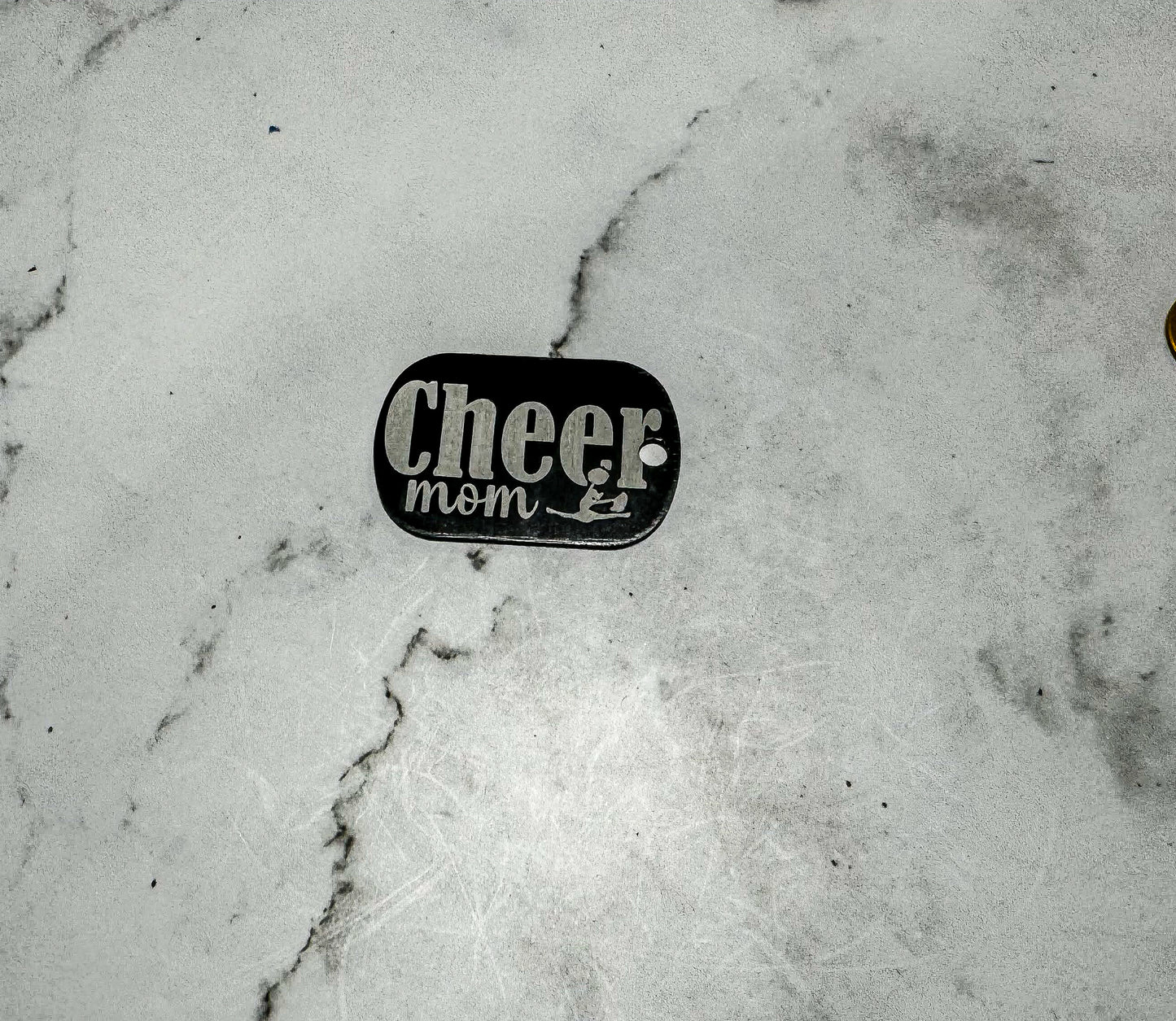 a close up of a skateboard on a marble surface