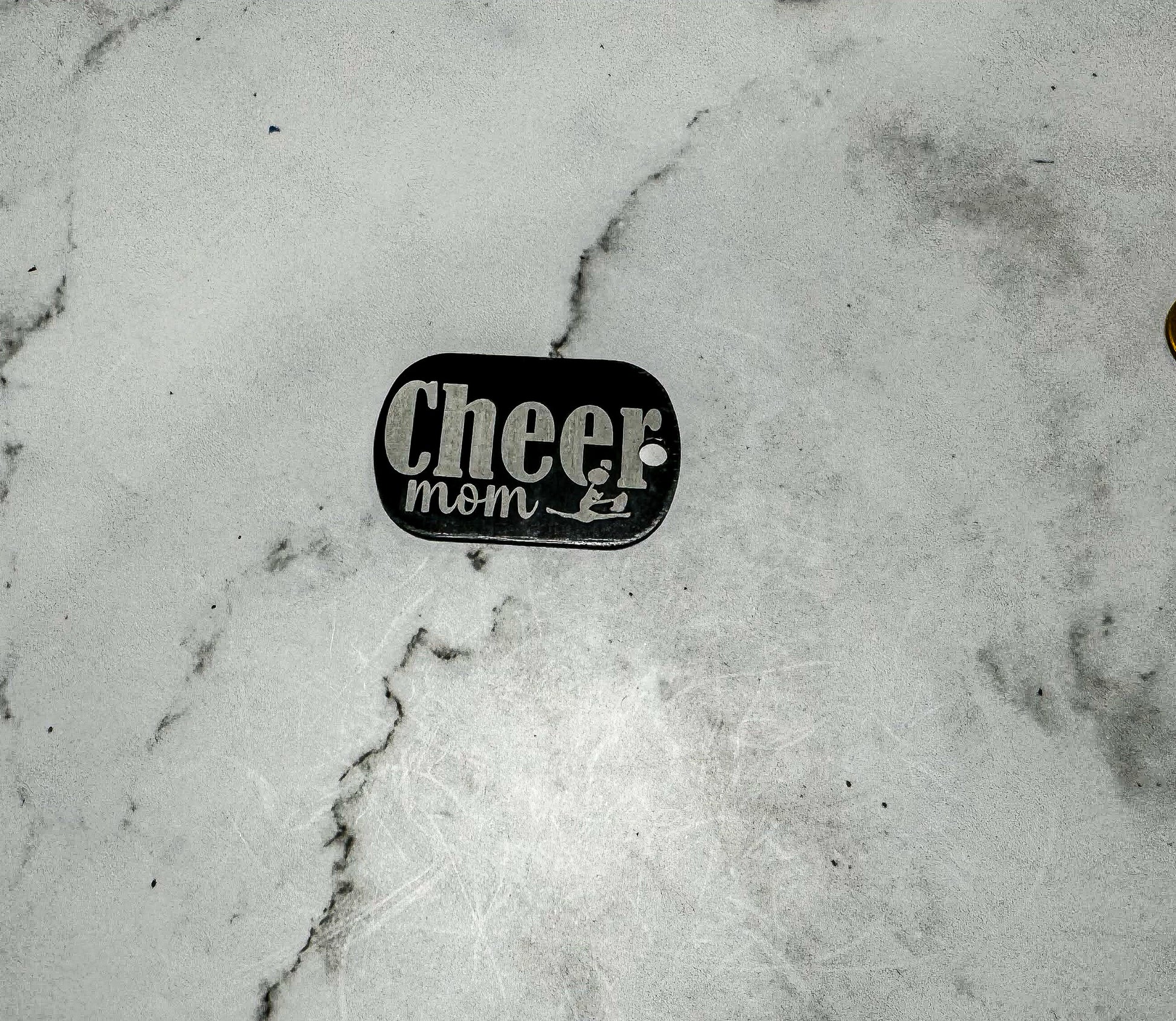 a close up of a skateboard on a marble surface