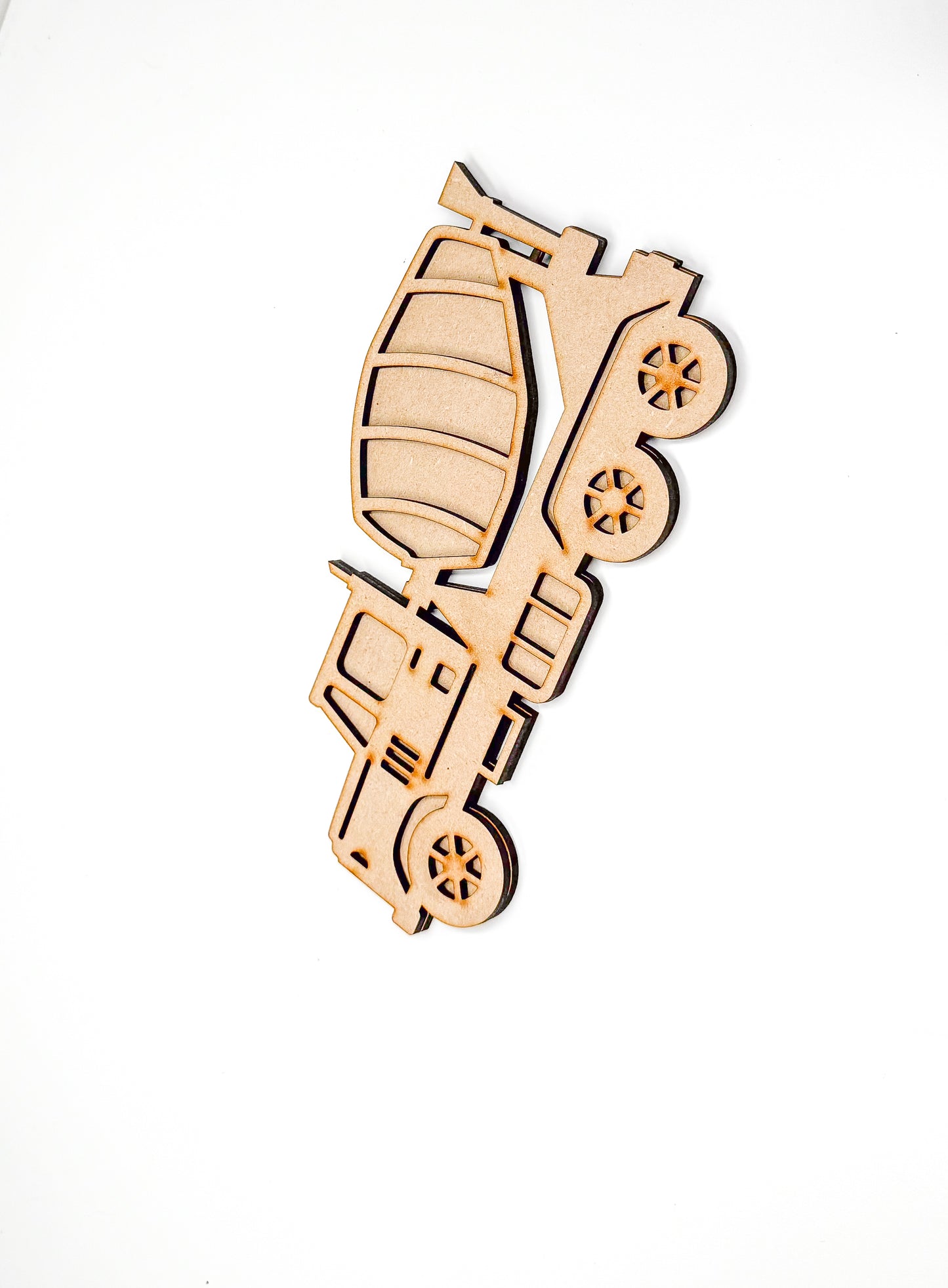 a wooden cutout of a train on a white background