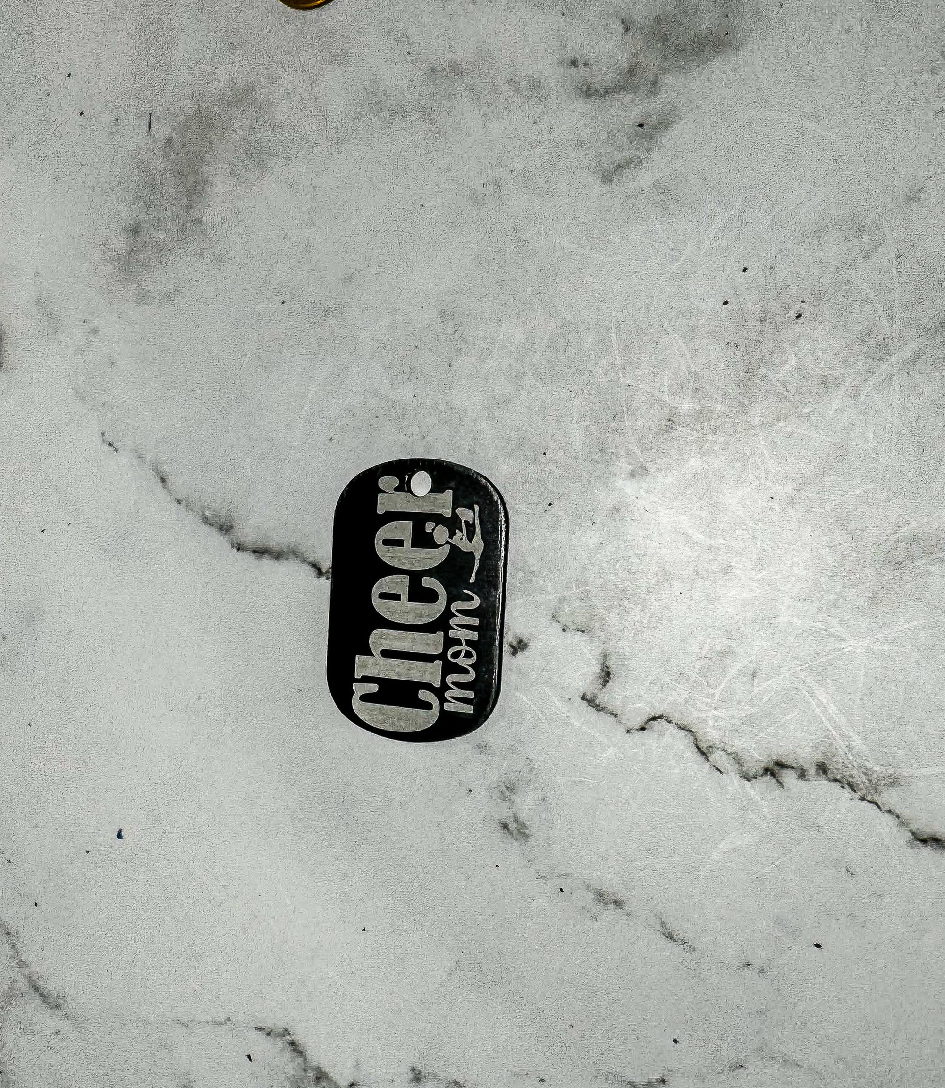 a black and white picture of a can on a marble surface