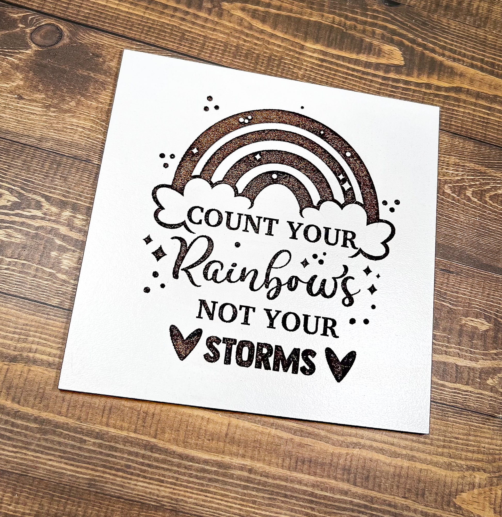 a card that says count your rainbows not your storm