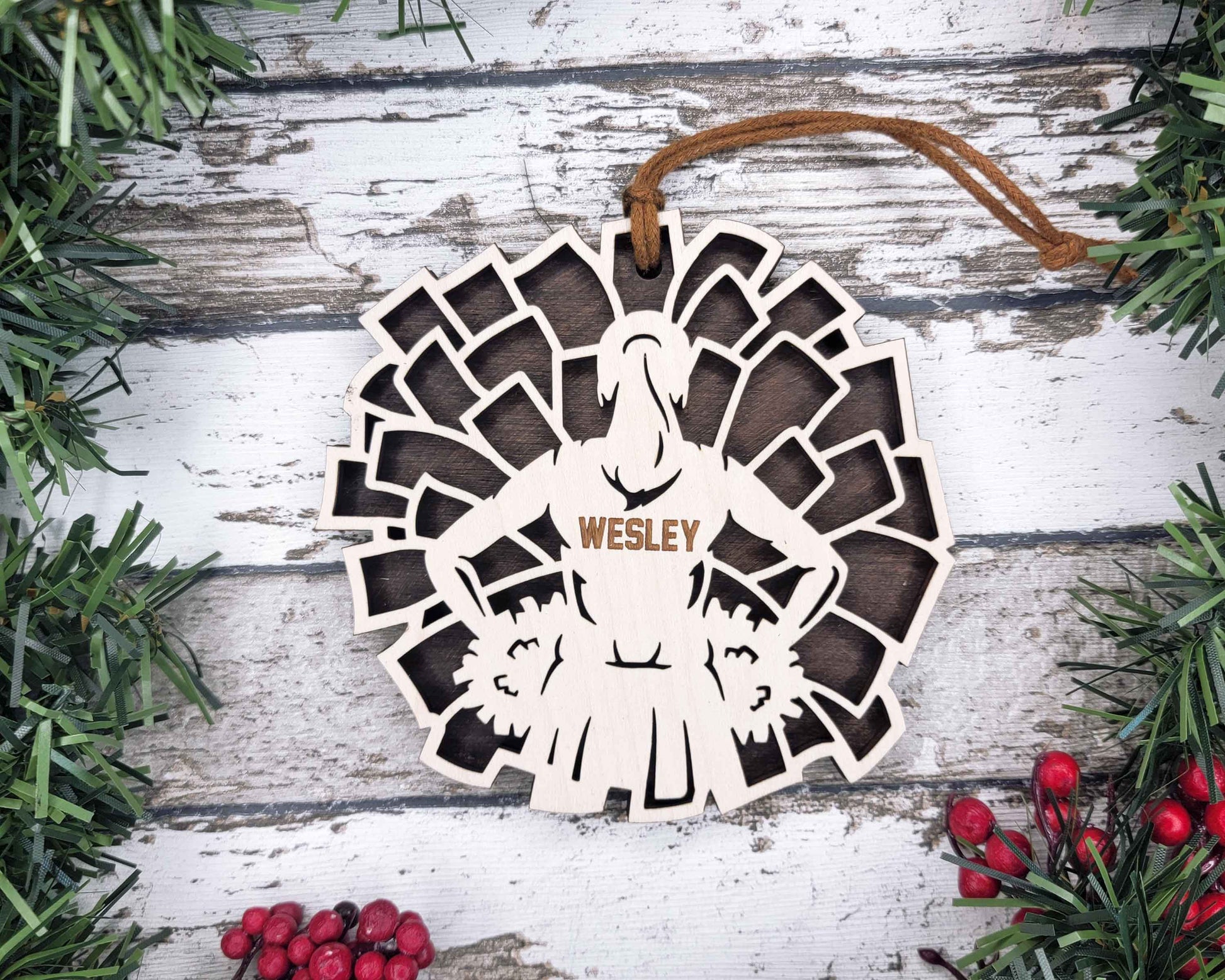 a wooden ornament with a picture of a woman on it