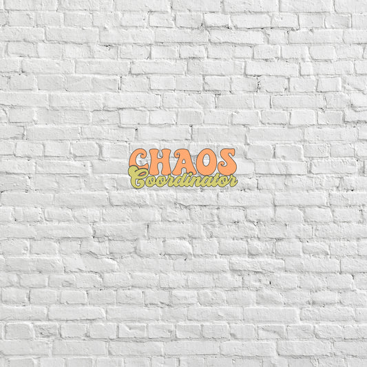 a white brick wall with the word chaos on it